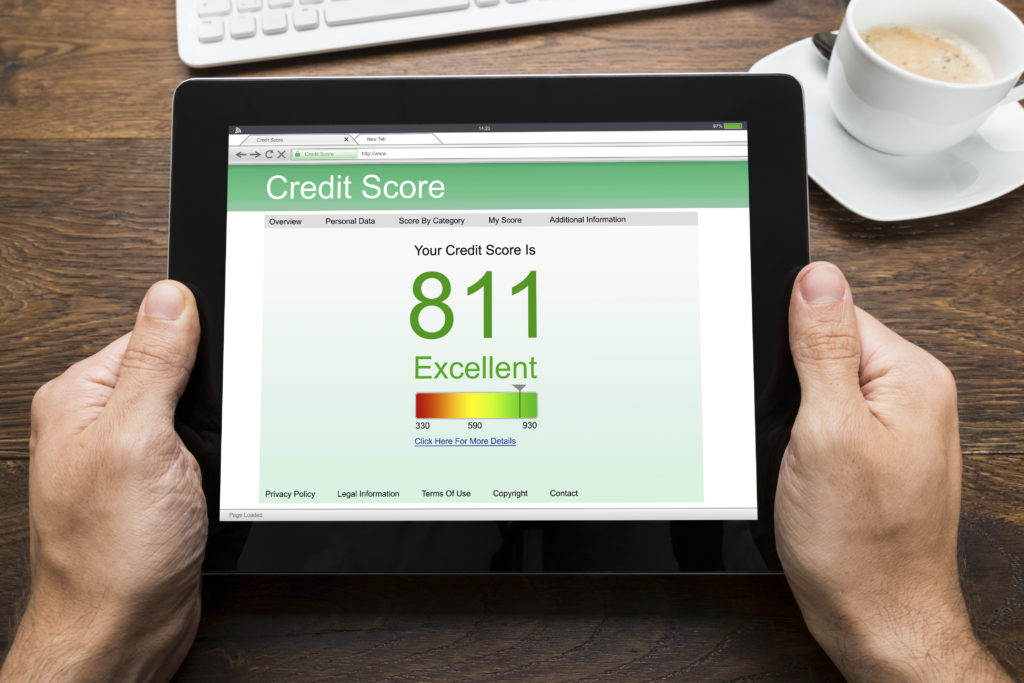 Tablet displaying a person's credit score