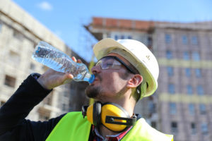 Contractor drinking water on a hot day