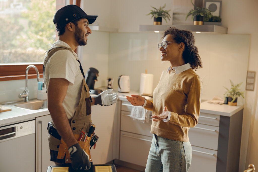 young master of household maintenance service consulting clients at home